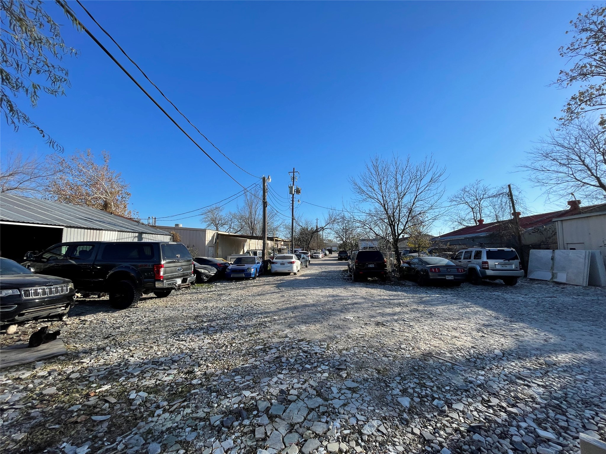 4920 West 34th Street Houston, TX 77092 - Photo 4 of 7 a view of a yard with car parked