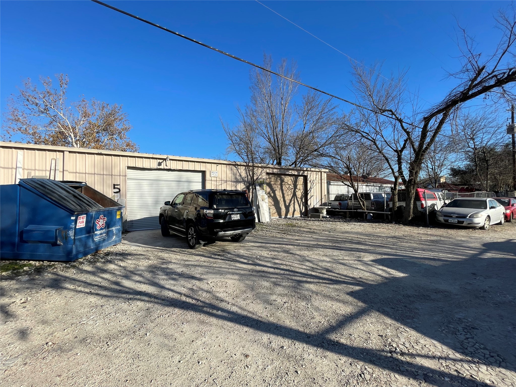 4920 West 34th Street Houston, TX 77092 - Photo 7 of 7 a view of street with parked cars