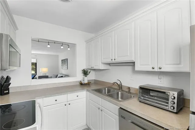 $245,000 | 5423 Southeast Miles Grant Road, Unit 201, Stuart, FL 34997