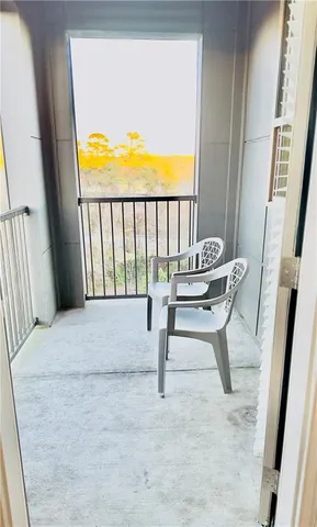 a view of pool with outdoor seating