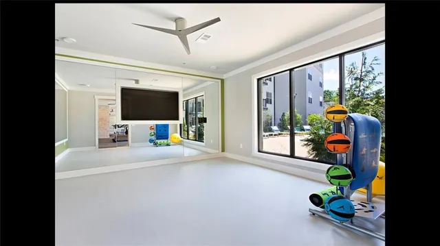 a view of a living room and dining room