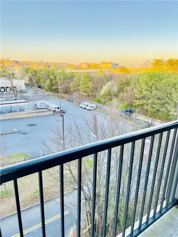 a picture of a bathroom with a sink and a shower