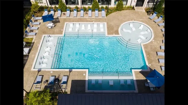 swimming pool view with a outdoor space
