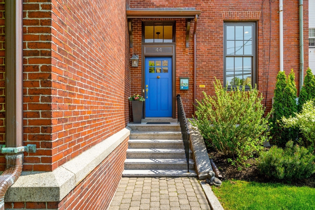 44 Pleasant Street, Unit 1 Marblehead, MA 01945 - Photo 29 of 35 a view of a brick building with many windows