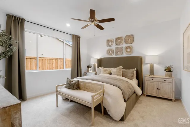 a bed room with a bed and a window