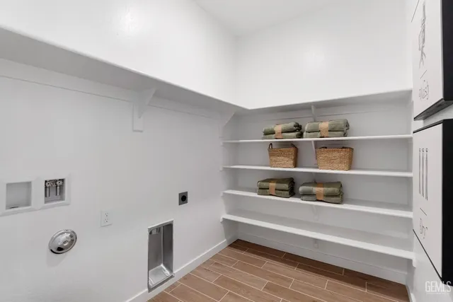 a shelf with books and knick knacks on it