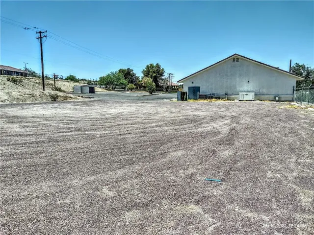 a view of a house next to a yard