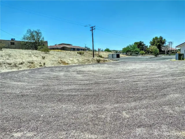 a view of a yard with an ocean view