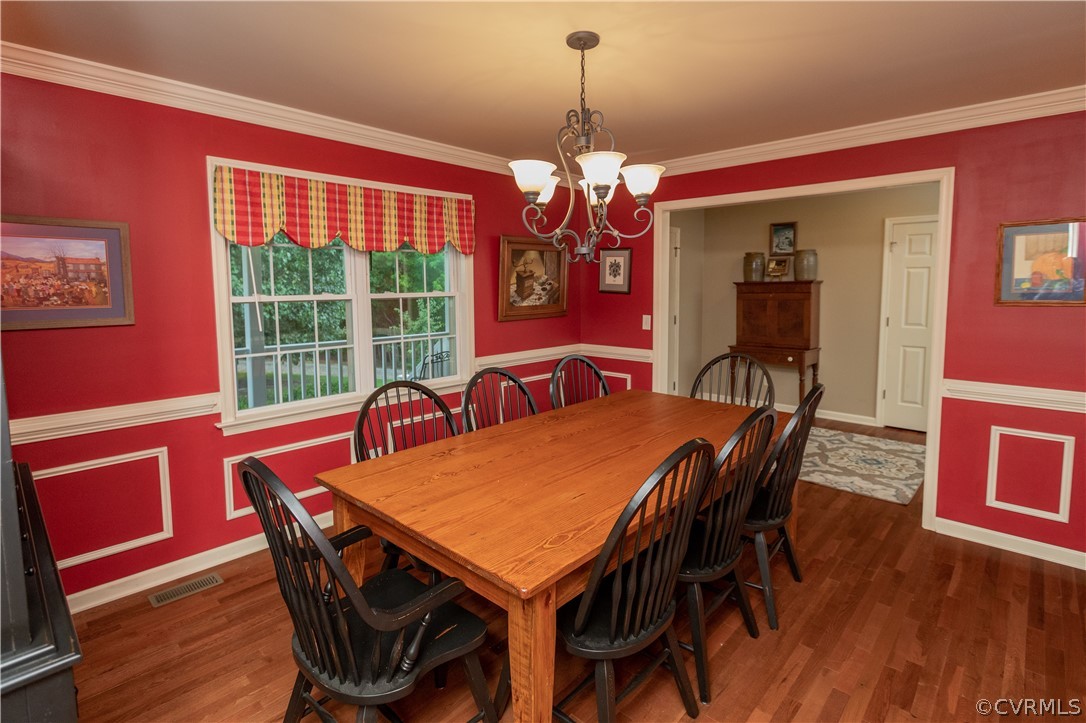 1286 Fletcher Chapel Road Kenbridge, VA 23944 - Photo 12 of 48 a view of a dining room with furniture window and wooden floor