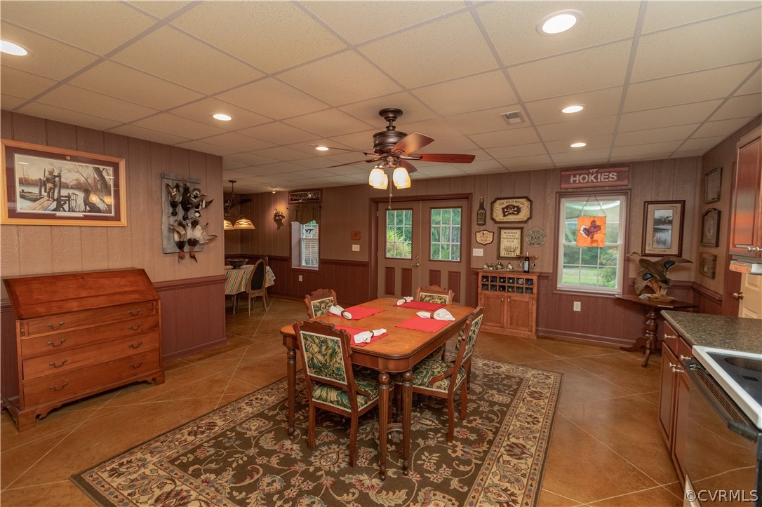 1286 Fletcher Chapel Road Kenbridge, VA 23944 - Photo 35 of 48 a living room with furniture a dining table and a piano table