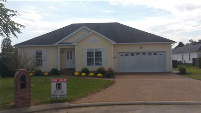 183 Abbey Road Gallatin, TN 37066 - Photo 1 of 4 a front view of a house with garden