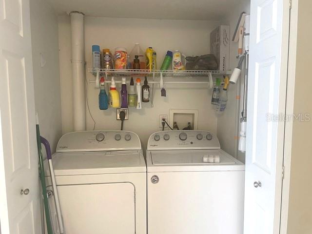 3461 Clark Road, Unit 160 Sarasota, FL 34231 - Photo 20 of 21 a utility room with dryer and washer