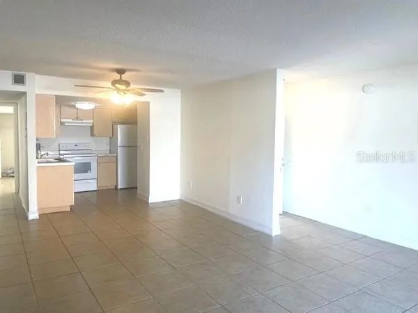 a view of a kitchen with a sink