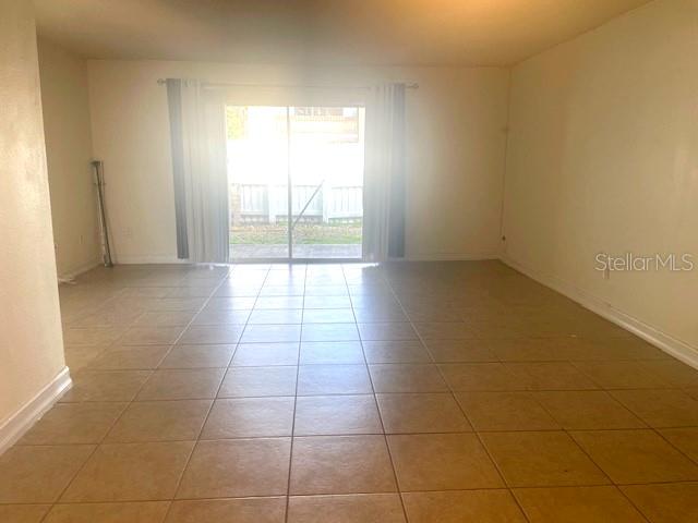 3461 Clark Road, Unit 160 Sarasota, FL 34231 - Photo 9 of 21 a view of an empty room and window