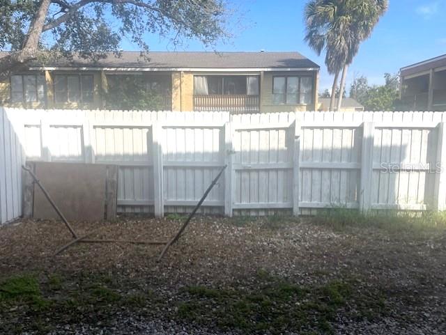 3461 Clark Road, Unit 160 Sarasota, FL 34231 - Photo 10 of 21 a view of backyard with small cabin