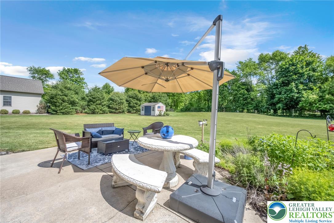 204 Bushkill Ridge Road Wind Gap, PA 18091 - Photo 42 of 48 A broad, green yard offers ample space for outdoor relaxation and recreation.