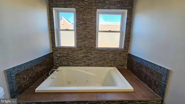 a bathroom with a bathtub