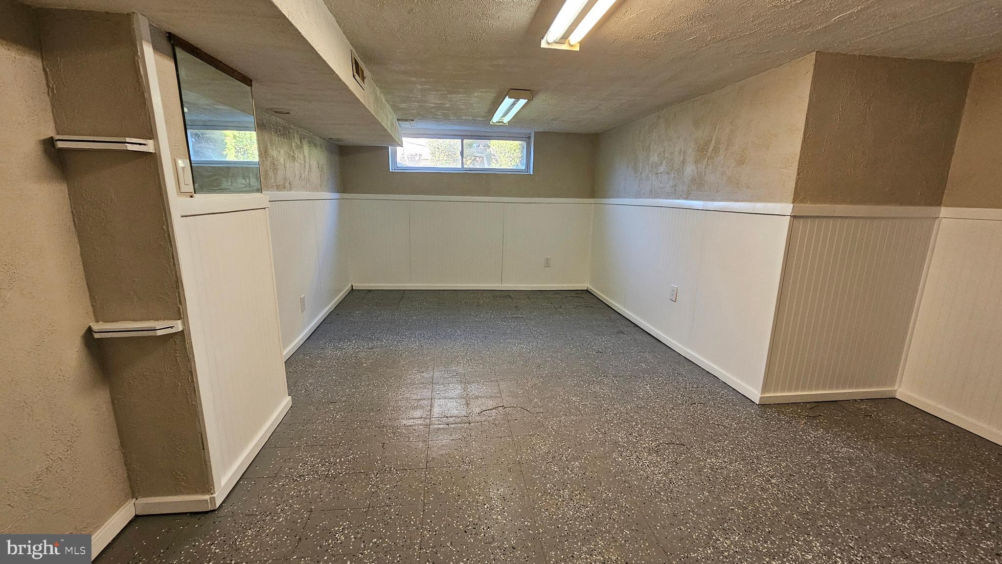 825 Laurel Road Lansdowne, PA 19050 - Photo 29 of 35 an empty room with windows