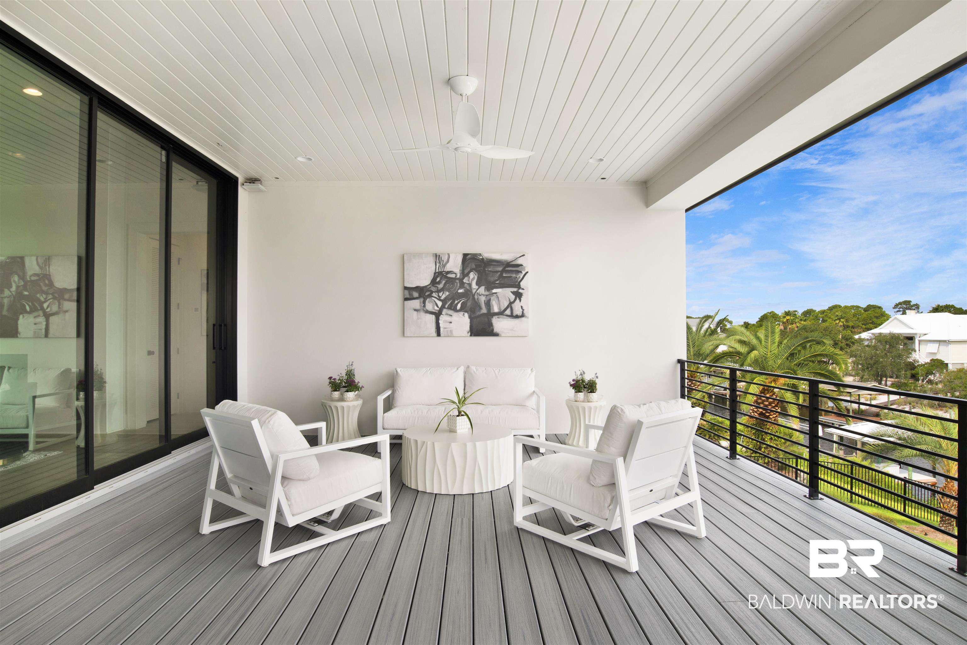 30239 Canal Court Orange Beach, AL 36561 - Photo 27 of 70 Wooden deck featuring a ceiling fan