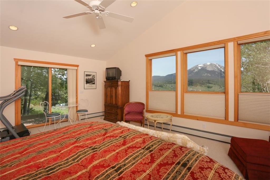 99 M Road Silverthorne, CO 80498 - Photo 16 of 33 a bedroom with a bed and a large window