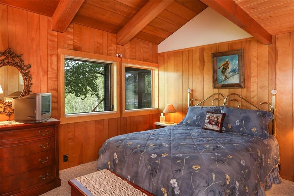 99 M Road Silverthorne, CO 80498 - Photo 19 of 33 a bedroom with a bed and window