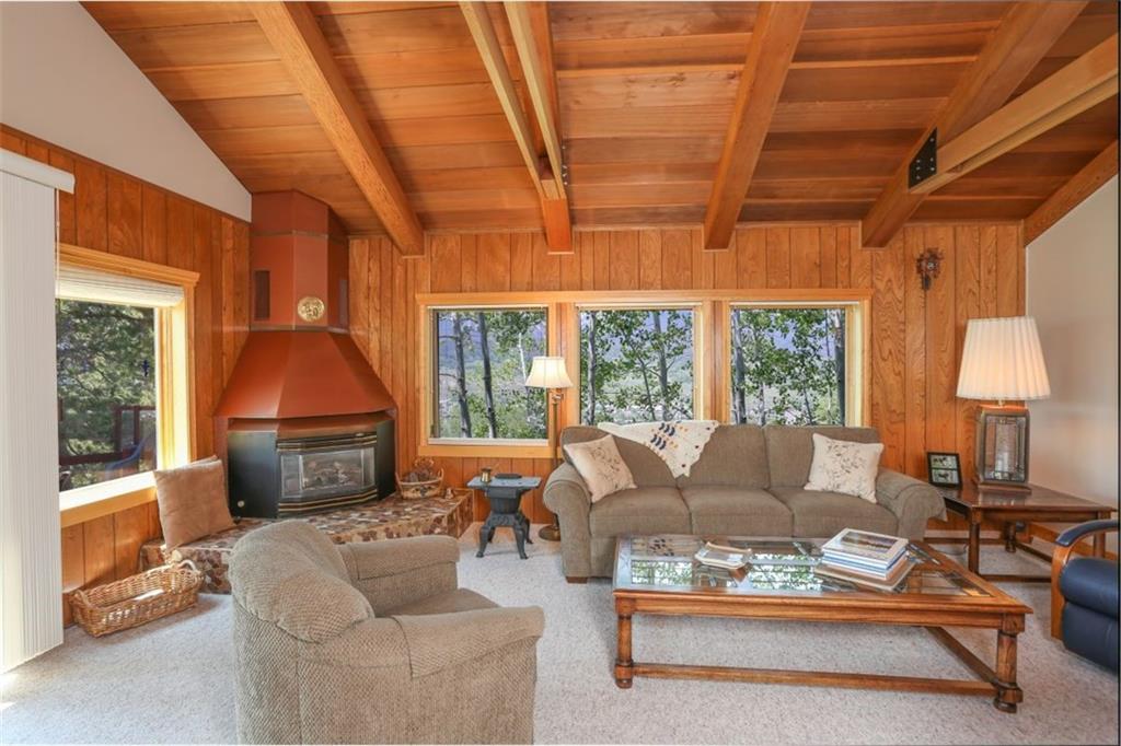 99 M Road Silverthorne, CO 80498 - Photo 20 of 33 a living room with furniture and a fireplace