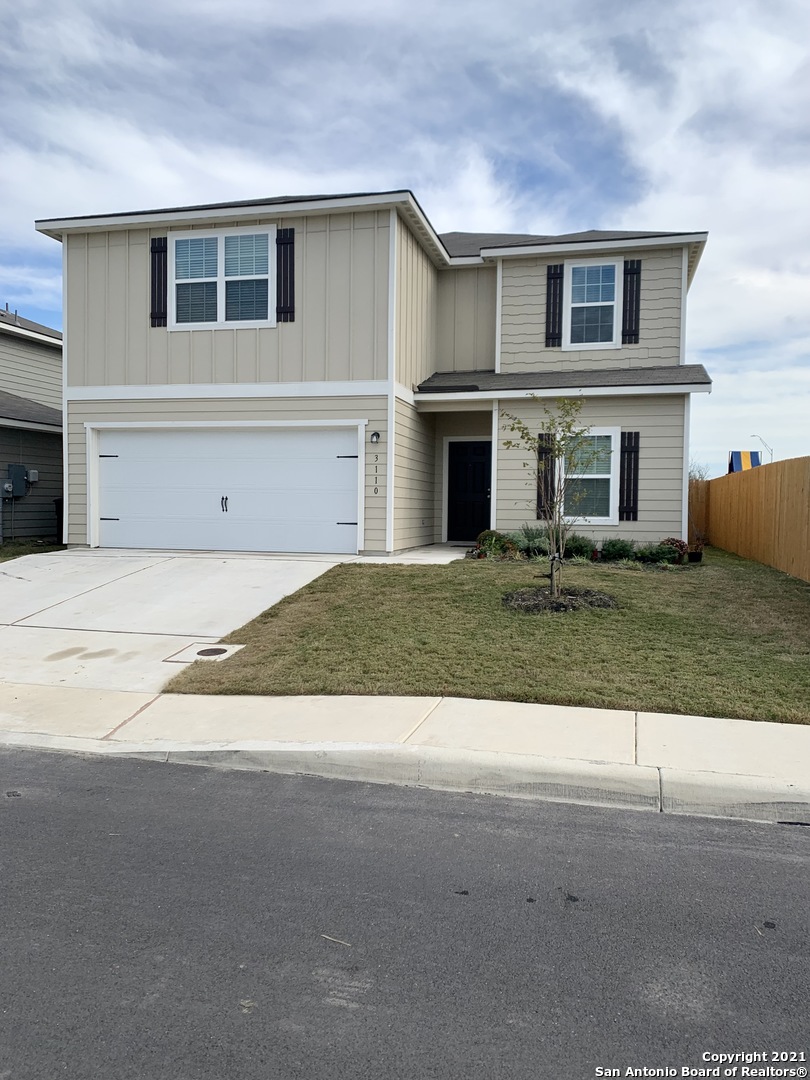 3110 Gilbert Garden Converse, TX 78109 - Photo 1 of 1 a front view of a house with a yard and garage