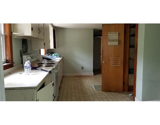34 Manning Road Chelmsford, MA 01824 - Photo 13 of 30 a kitchen with stainless steel appliances a refrigerator and a sink