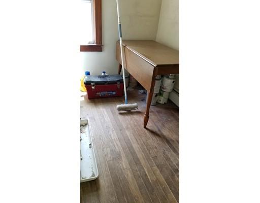 34 Manning Road Chelmsford, MA 01824 - Photo 20 of 30 a bedroom with a bed and a cabinets