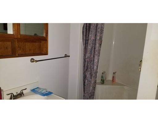 34 Manning Road Chelmsford, MA 01824 - Photo 28 of 30 a bathroom with a sink and a mirror