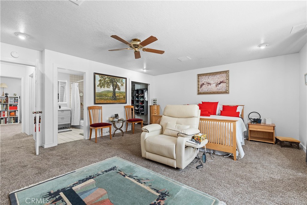 1876 Sparrow Road Wrightwood, CA 92397 - Photo 17 of 31 a living room with furniture and a rug