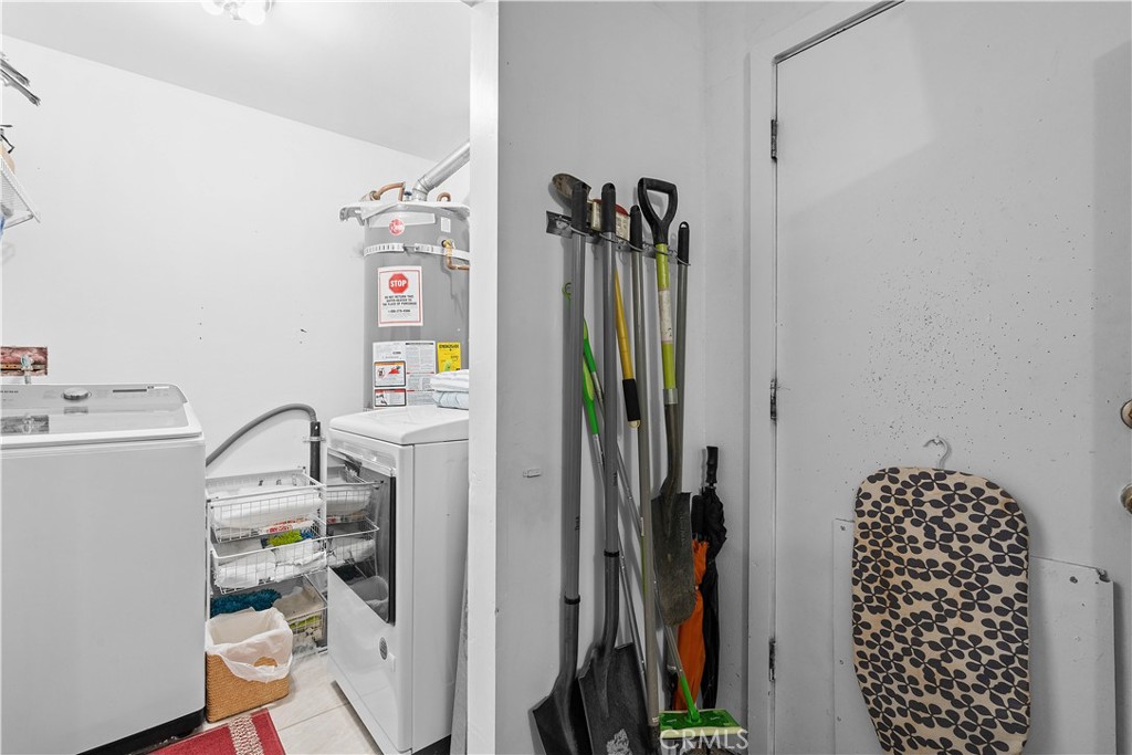 1876 Sparrow Road Wrightwood, CA 92397 - Photo 28 of 31 a view of walk in closet with clothes and shoes