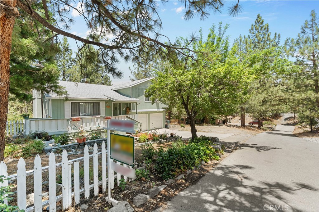 1876 Sparrow Road Wrightwood, CA 92397 - Photo 30 of 31 a front view of house with yard and trees around