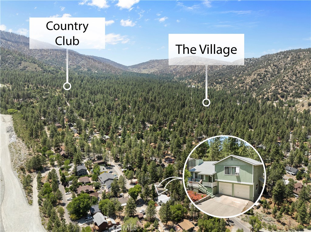 1876 Sparrow Road Wrightwood, CA 92397 - Photo 4 of 31 a view of a wooden house with a sign of it