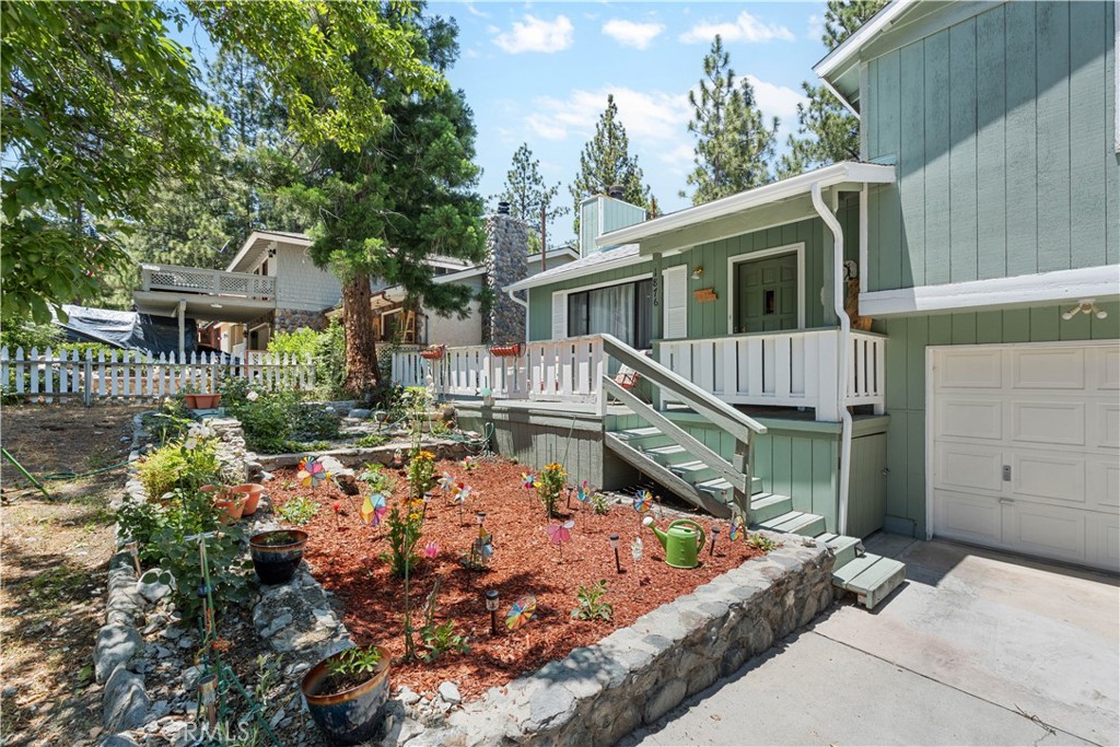 1876 Sparrow Road Wrightwood, CA 92397 - Photo 5 of 31 a view of house with wooden deck and furniture