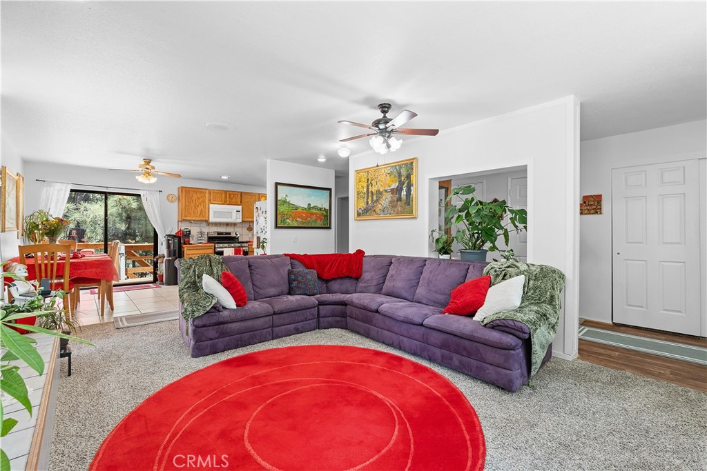 1876 Sparrow Road Wrightwood, CA 92397 - Photo 9 of 31 a living room with furniture and a large window