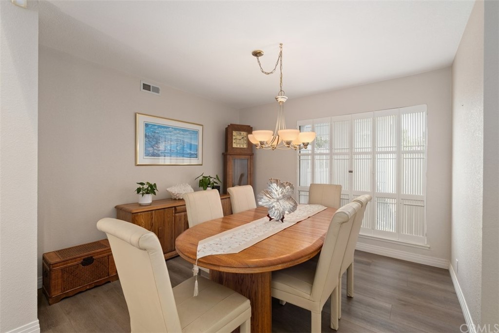 33491 Periwinkle Drive Dana Point, CA 92629 - Photo 14 of 41 a view of a dining room with furniture window and wooden floor