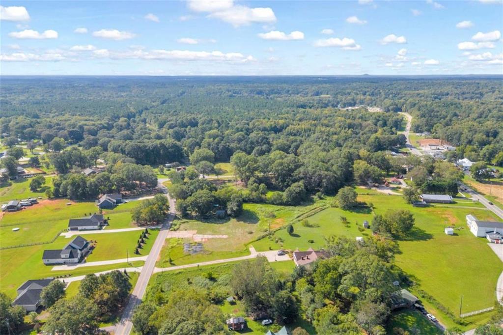 2720 John Stowe Road Monroe, GA 30656 - Photo 6 of 17 an aerial view of residential houses with outdoor space