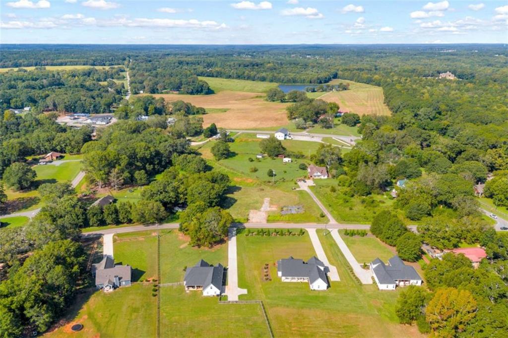 2720 John Stowe Road Monroe, GA 30656 - Photo 8 of 17 an aerial view of residential houses with outdoor space and ocean view