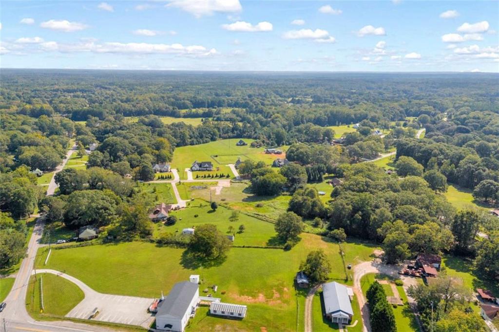 2720 John Stowe Road Monroe, GA 30656 - Photo 10 of 17 an aerial view of residential houses with outdoor space