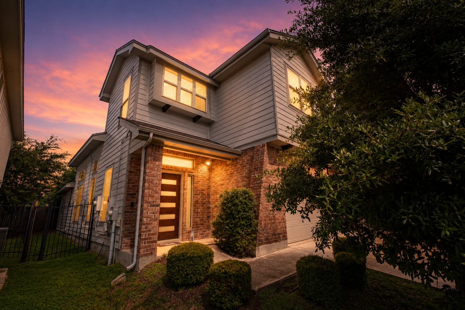 1007 Totis Road Austin, TX 78748 - Photo 1 of 37 a view of a house with a large window and a tree