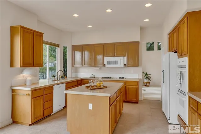 a view of a room with sliding glass door and mountain view