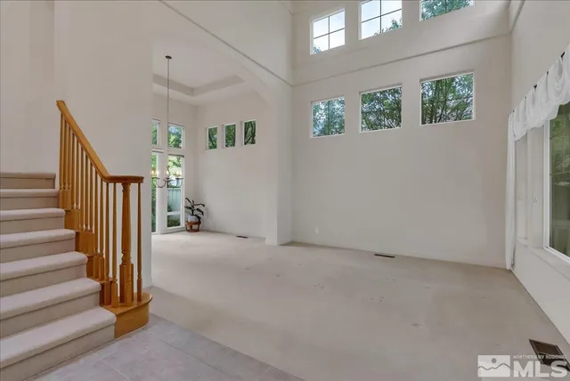 a view of livingroom with furniture and windows