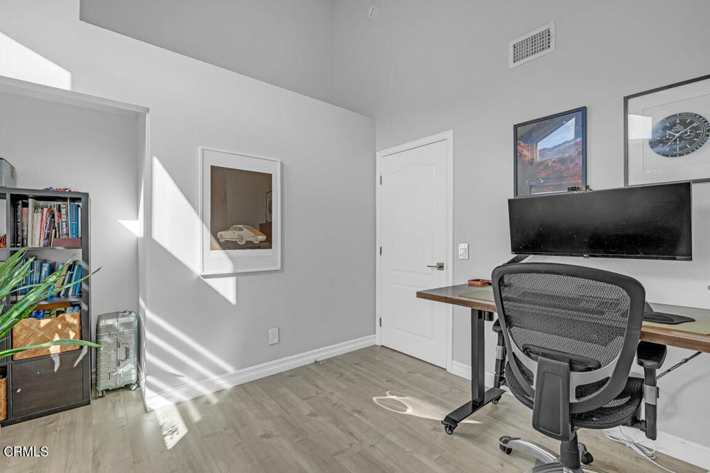 6301 Honolulu Avenue, Unit 47 Tujunga, CA 91042 - Photo 22 of 40 a view of a livingroom with furniture and a flat screen tv