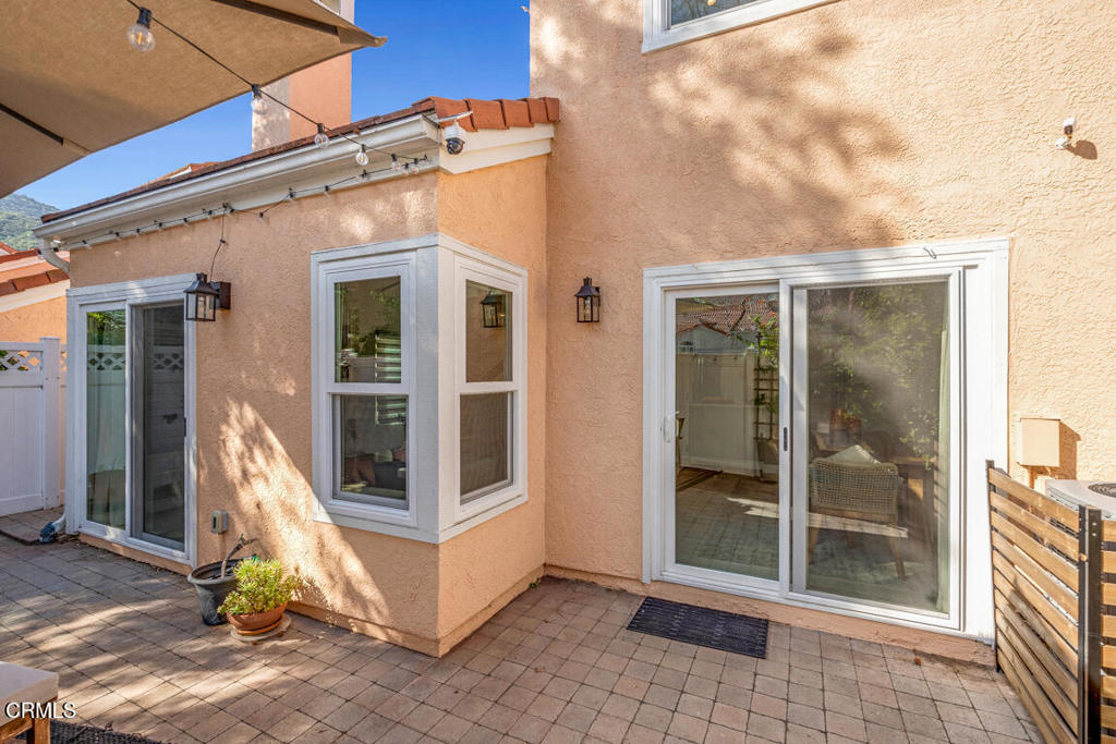 6301 Honolulu Avenue, Unit 47 Tujunga, CA 91042 - Photo 32 of 40 a view of a building with glass door and glass door