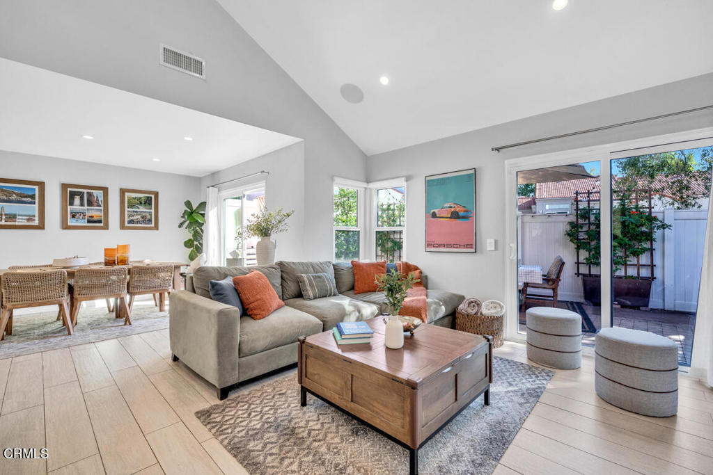 6301 Honolulu Avenue, Unit 47 Tujunga, CA 91042 - Photo 6 of 40 a living room with furniture and a large window