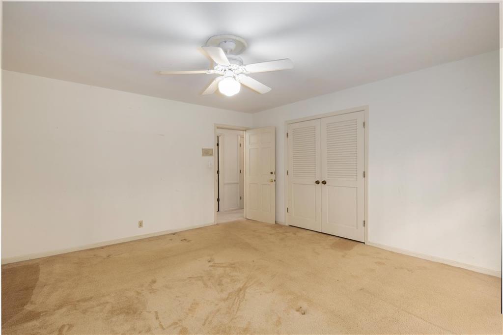 5416 Pheasant Run Smoke Rise, GA 30087 - Photo 17 of 47 a view of an empty room