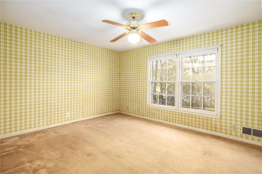 5416 Pheasant Run Smoke Rise, GA 30087 - Photo 18 of 47 a view of an empty room with a window