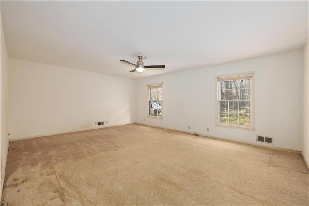 5416 Pheasant Run Smoke Rise, GA 30087 - Photo 22 of 47 a view of an empty room with a window