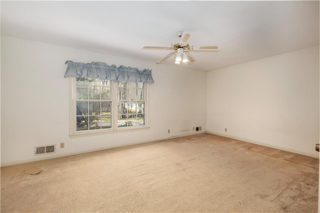 5416 Pheasant Run Smoke Rise, GA 30087 - Photo 24 of 47 a view of an empty room with a window